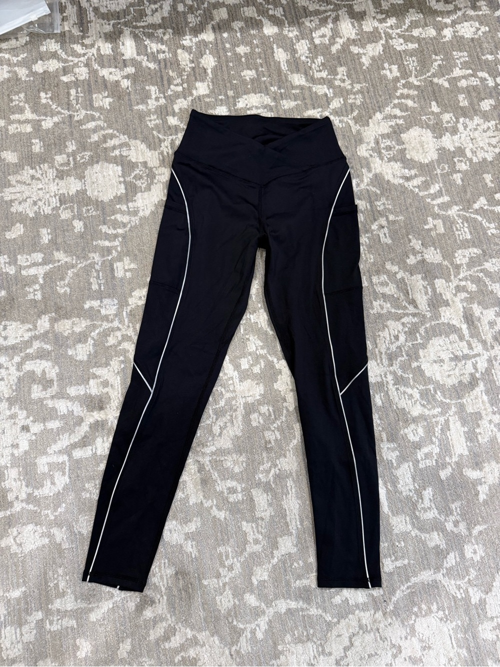 Women's Black High-Rise Leggings with reflective white detail size small